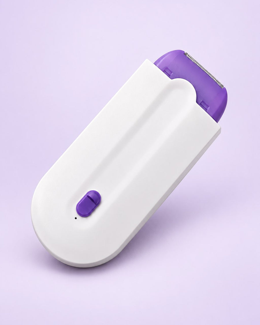 Palm-sized white hair remover with a purple head