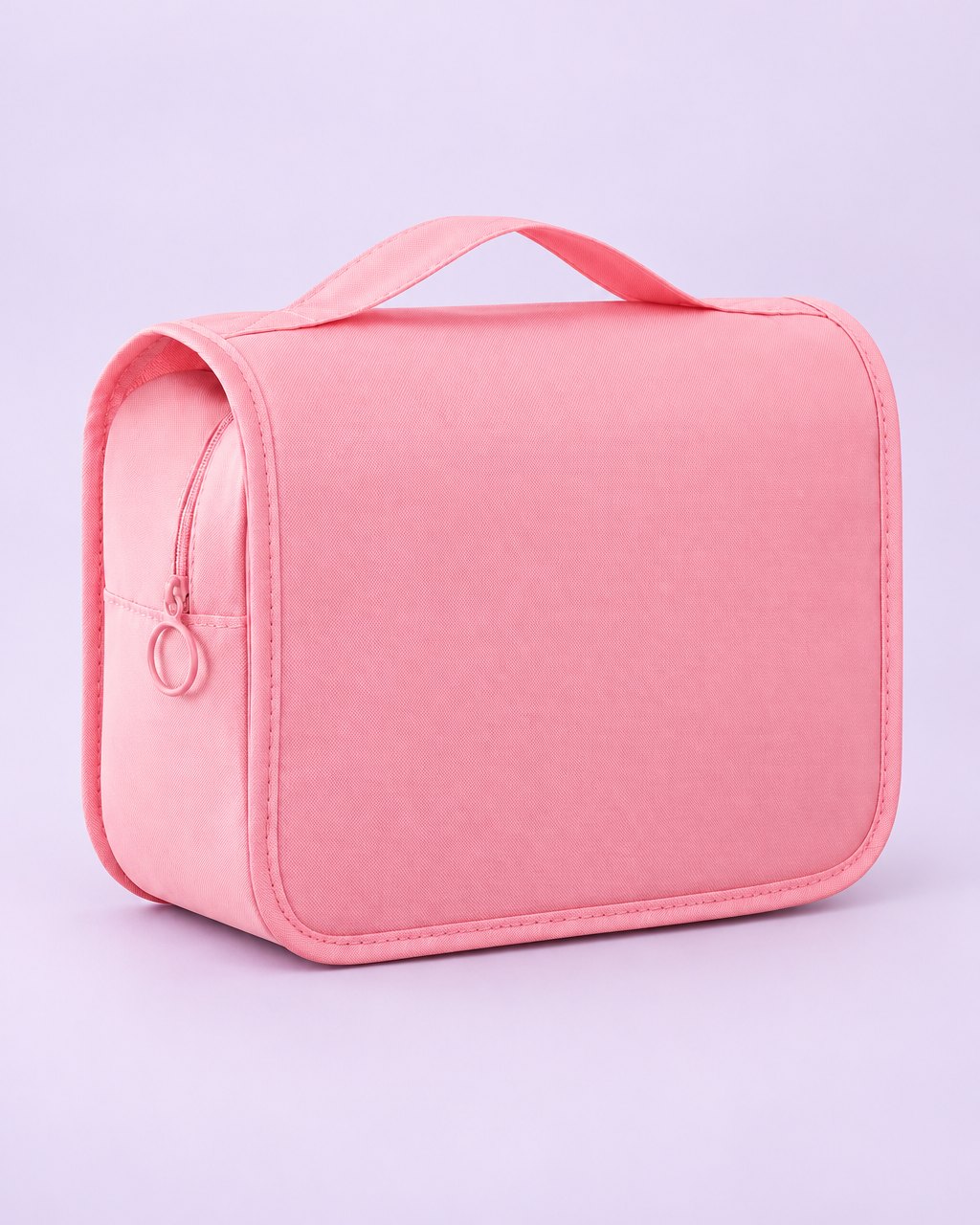 Pink hanging toiletry bag with a top handle