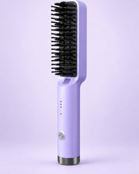 Purple heated straightening brush with black bristles