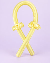 Yellow heatless curling rod with two scrunchies