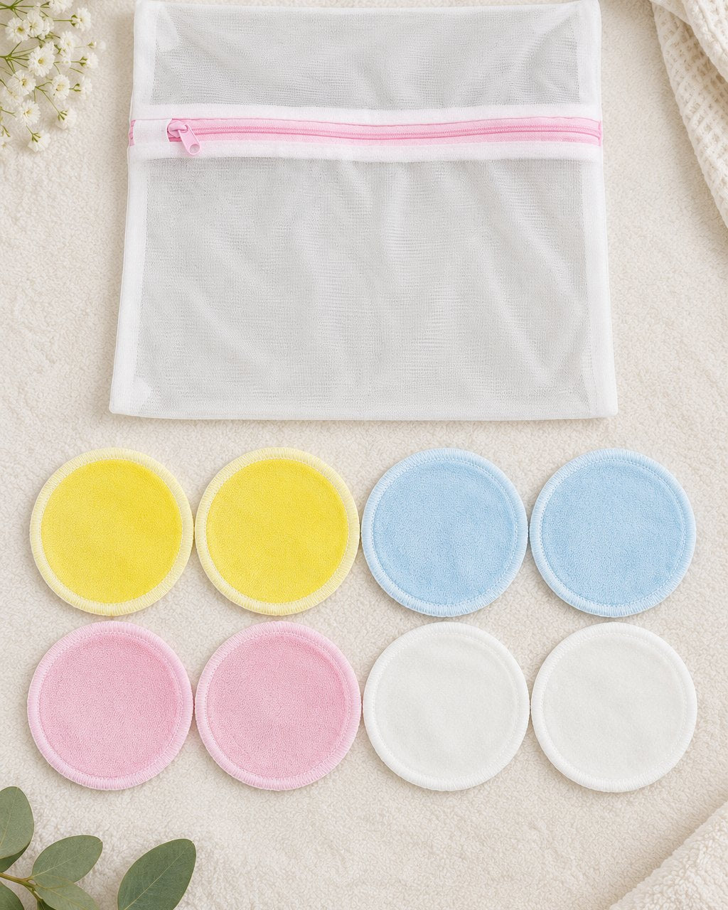 All eight rounds laid out in two rows above the white mesh wash bag