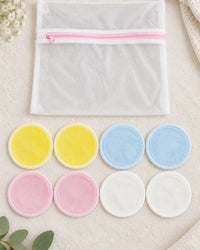All eight rounds laid out in two rows above the white mesh wash bag